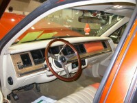 Custom Nardi woodgrain steering wheel and Alpine CD source unit