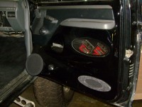 Completed fiberglass door panel with component speakers
