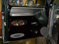 Completed fiberglass door panel with component speakers